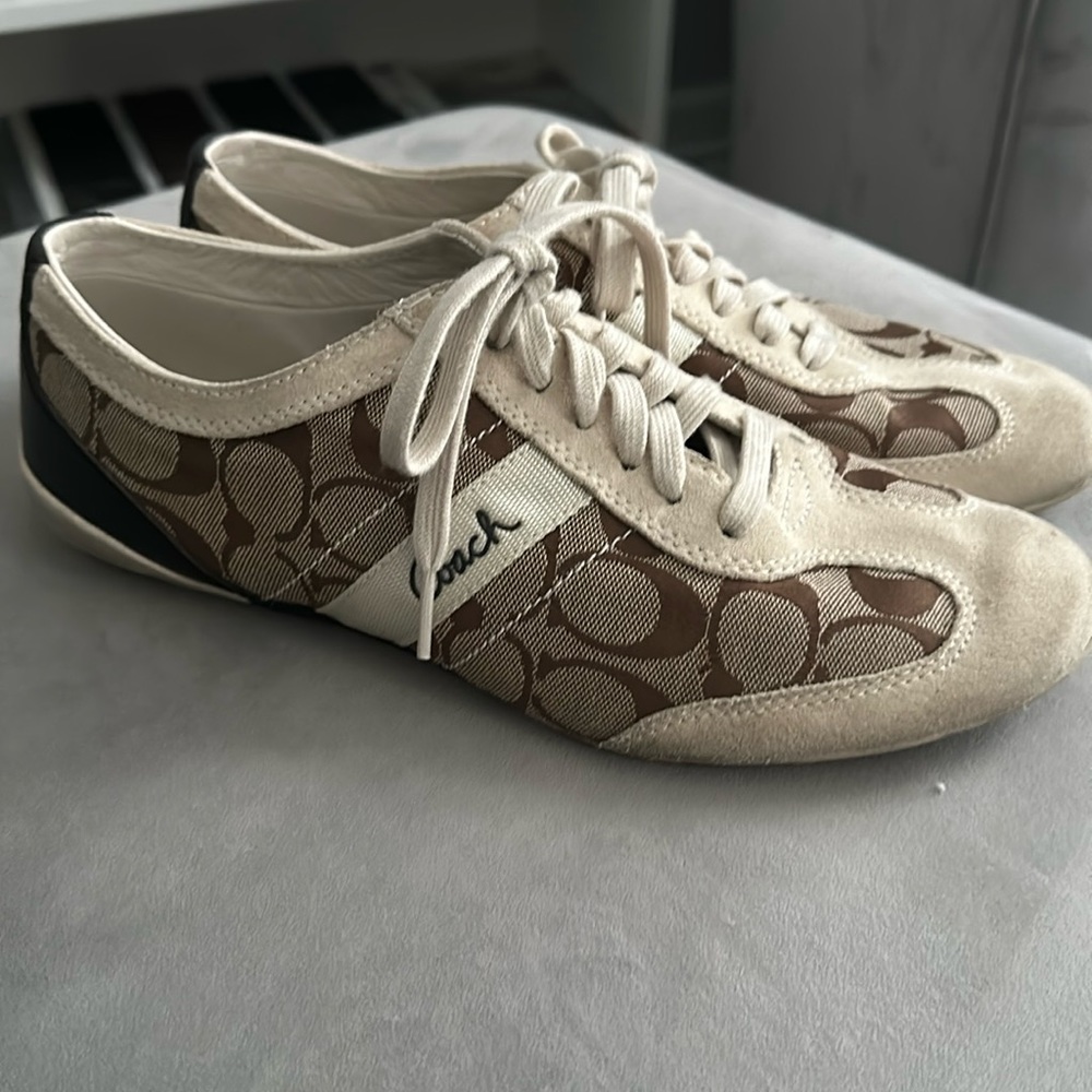 Women’s tan and chocolate brown Coach tennis shoes